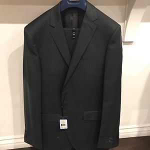 Paul Betenly Suit, 40L/ 33L. Brand new. Never used. Charcoal.